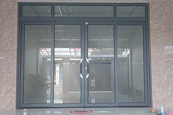 Cửa trượt quay nhôm kính Aluvina
