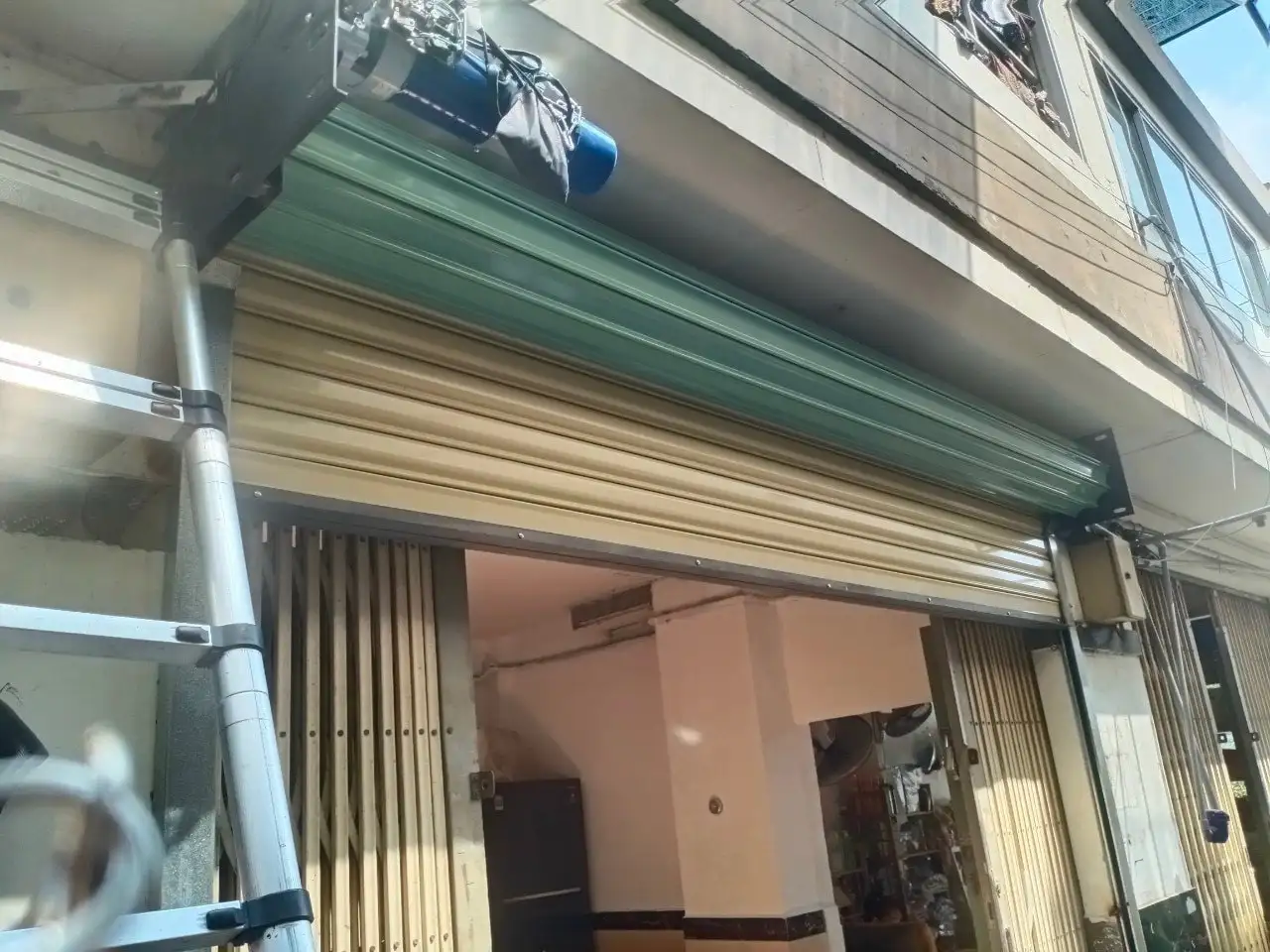 sửa cửa cuốn